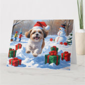 Shih Tzu läuft in Snow mit Weihnachtshut Karte (Vorderseite)