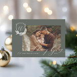 Shining Glory Winter Garland Monogram Crest Photo Feiertagskarte<br><div class="desc">Embrace the shining glory of the holiday season with our winter garland monogram crest Christmas photo holiday card. Our personalized card features our winter garland monogram crest design with your photo. Customize with family signature and monogram. Spread the love and cheer this winter with these stunning cards. Design by Moodthology...</div>