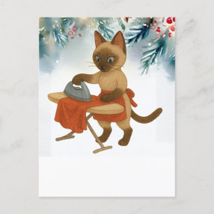 Siamese Cat bügelt zu Weihnachten