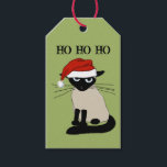 Siamese Cat Funny Santa Kitty Custom Christmas Geschenkanhänger<br><div class="desc">HO HO HO. Die Siamkatze ist begeistert,  eine Weihnachtsmannmütze zu tragen. Fügen Sie die passende Touch Ihrem Urlaubsgeschenk-Verpackung mit dieser lustigen Katze zu & von Weihnachtsmarke hinzu.</div>