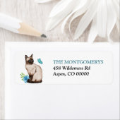 Siamesen-Katze und Blauer Schmetterling-Rücksendea (Insitu)