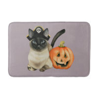 Siamesische Katze Halloweens mit Jack O Laterne