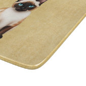 Siamkatze auf altem Papier Schneidebrett (Ecke)