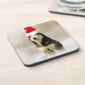 Siberischer Husky-Hund mit Weihnachtsmannmütze im  Getränkeuntersetzer (Linke Seite)