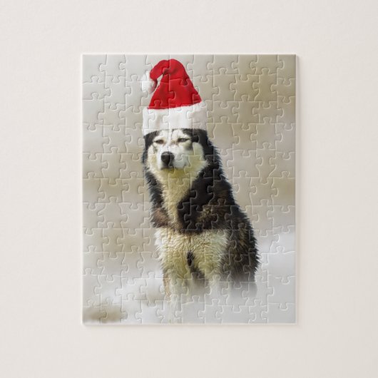 Siberischer Husky-Hund mit Weihnachtsmannmütze im  Puzzle (Vertikal)
