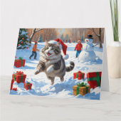 Sibirische Katze läuft im Schnee mit Weihnachtsmüt Karte (Vorderseite)