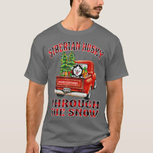 Sibirischer Husky durch den schneeweihnachtlichen T-Shirt