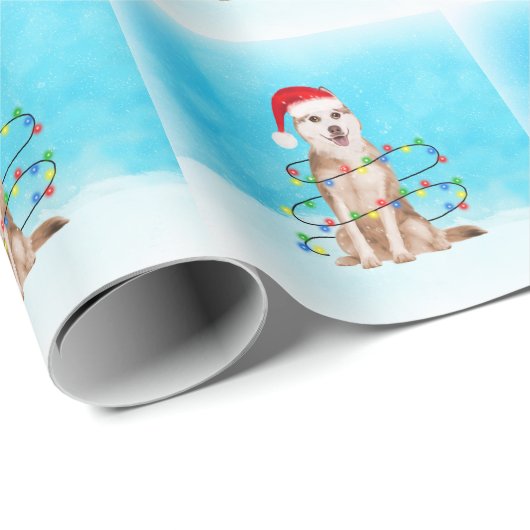 Sibirischer Husky-Hund im Schnee mit Weihnachtsman Geschenkpapier (Rolleneckpunkt)