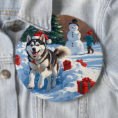 Sibirischer Husky läuft im Schnee mit Weihnachtsmü Button (Beispiel)