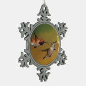 Sich hin- und herbewegender Rufous Kolibri Schneeflocken Zinn-Ornament (Links)