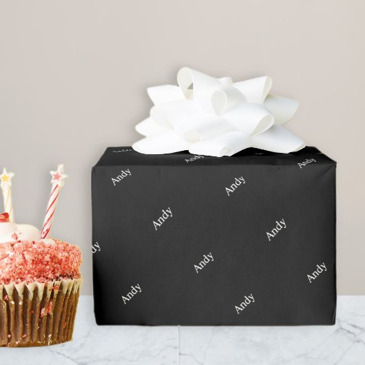 Sich wiederholendes Namens- oder Wortmuster Schwar Geschenkpapier