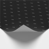 Sich wiederholendes Namens- oder Wortmuster Schwar Geschenkpapier (Ecke)