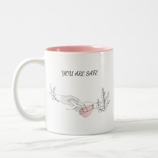 Sichere Embrace Zweifarbige Tasse (Links)