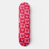 Sichtbares Muster in rosa und rotem Herzen Skateboard (Vorderseite)