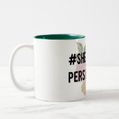 Sie bestand Tasse fort (Links)