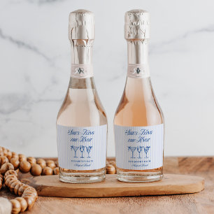 Sie bindet die elegante Hand der Knot-Küste. Schaumweinetikett