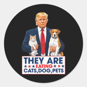 Sie essen die Hunde, die Katzen, die Haustiere. Runder Aufkleber