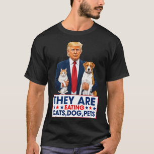 Sie essen die Hunde, die Katzen, die Haustiere. T-Shirt