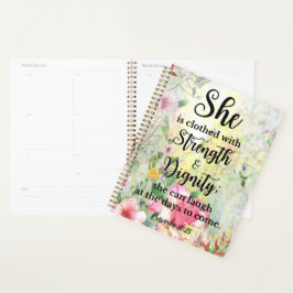Sie ist bekleidet mit einer Blumenschrift Planer