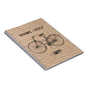 Sie plus Fahrrad entsprechen glücklicher antiker Notizblock (Rechte Seite)