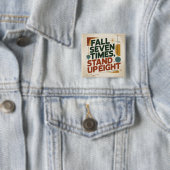 Sieben Mal fallen, acht Mal aufstehen Button (Beispiel)