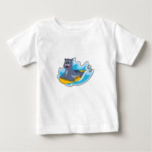 Siegel als Surfer mit Surfbrett Baby T-shirt
