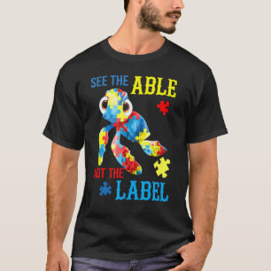 Sieh die Fähigkeit, nicht das Etikett Turtle Puzzl T-Shirt