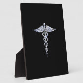 Silber wie Caduceus Medical Symbol auf schwarzer D Fotoplatte (Seite)