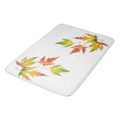 Silberapfel auf einer Badematte (Schrägansicht)