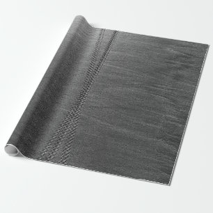 Silberkettenverbindung auf grauem Textil Geschenkpapier
