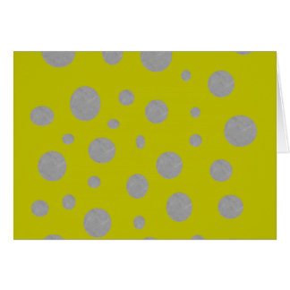 Silberne Polka‑Punkte auf goldenem Hintergrund