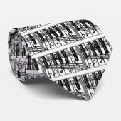 Silberne schwarze Klavier-Tastatur merkt und Krawatte (Gerollt)