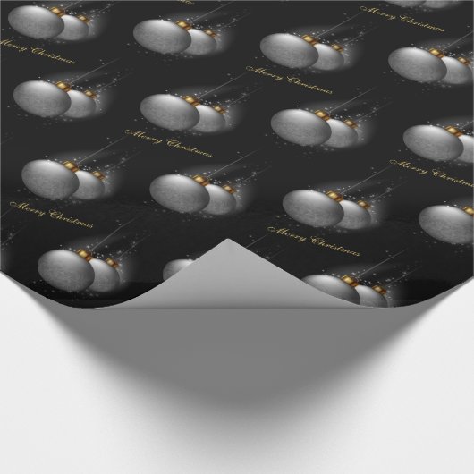 Silberner Flitter auf schwarzem Packpapier (Ecke)