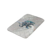 Silberner gerahmter Elefant auf Ohrschnecke und Badematte (Schrägansicht)