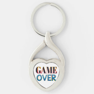 Silberner Schlüsselanhänger mit dem Text "Game Ove