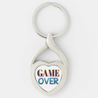 Silberner Schlüsselanhänger mit dem Text "Game Ove