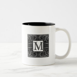 Silbernes Monogramm des Celtic-"M" Zweifarbige Tasse