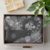 Silberschneeflocken Glitzern und Lichter auf schwa Seidenpapier (Geschenk)