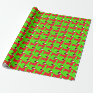 Silhouette Dackel mit einem Weihnachtshut auf Geschenkpapier