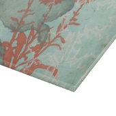 Silhouette der Roten Blume über den Aquamarinen Hi Schneidebrett (Ecke)