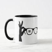 Silhouette der Tasse des Handhaltens (Links)