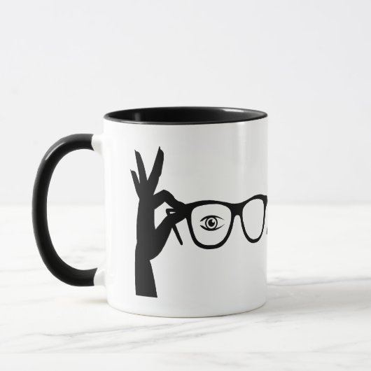 Silhouette der Tasse des Handhaltens (Links)