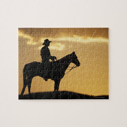 Silhouette des Cowboys auf Pferden bei Sonnenunter Puzzle (Horizontal)