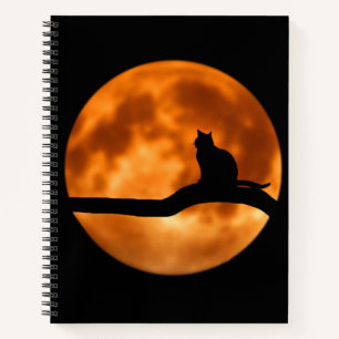 Silhouette einer schwarzen Katze in einem Baum Notizblock