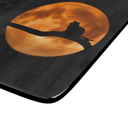 Silhouette einer schwarzen Katze in einem Baum Schneidebrett (Ecke)