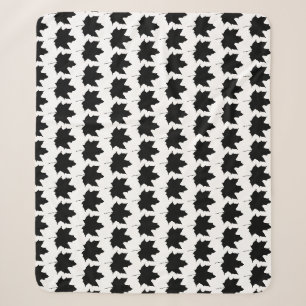 Silhouette eines Ahornblattes Sherpadecke