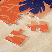 Silhouette mit blauer Palme, orangefarbener Hinter Puzzle (Seite)