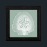 Silhouette Sand Dollar Geschenkbox<br><div class="desc">Können Sie sich vorstellen,  Ihr Leben am Strand zu verbringen? Holen Sie sich dieses schöne Bild dieser Silhouette und Dollar,  um Ihre Strandkollektion zu ergänzen. Dieses einzigartige,  lichtdurchlässige Kunstwerk ist großartig für jedes Ihrer Zazzle-Produkte. Es ist zeitgenössische und moderne Kunst macht Sie zum stilvollsten unter Ihren Freunden.</div>