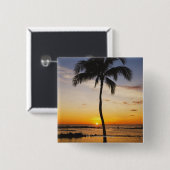 Silhouette von einer Palme durch einen roten Button (Vorne & Hinten)