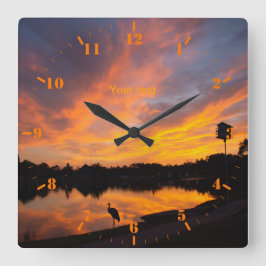 Silhouette von Sandhill-Kranen bei Sonnenuntergang Quadratische Wanduhr